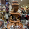 A milk-chocolate fountain in a shop window