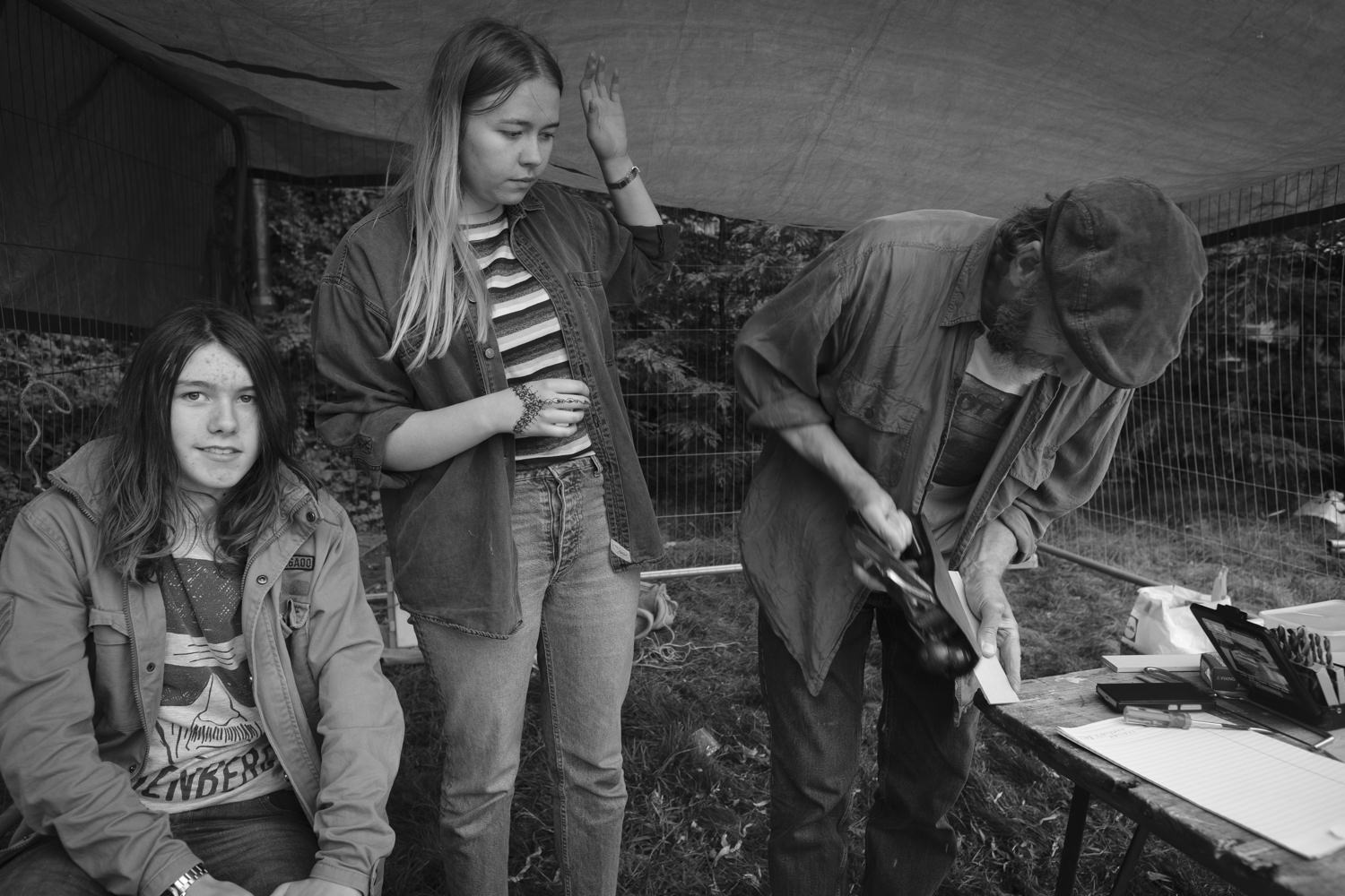 Dennis with his two young assistants.